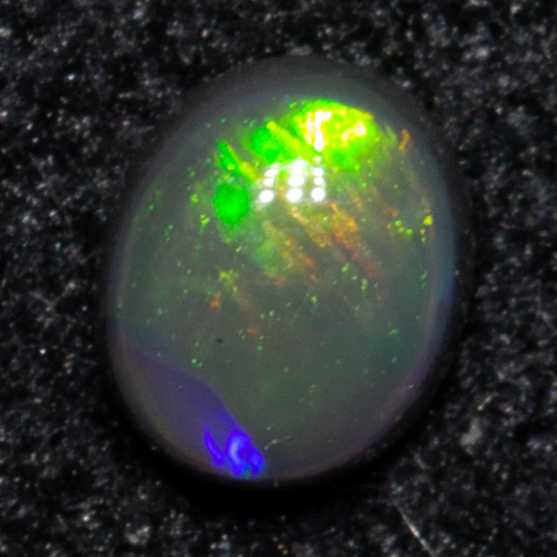 0.10 ct black opal 3.3x2.8x1.6mm