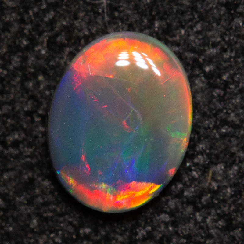 0.15 ct black opal 4.6x3.7x1.4mm