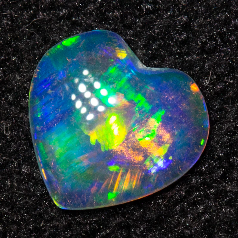 0.18 ct crystal opal 5.1x4.9x1.3mm