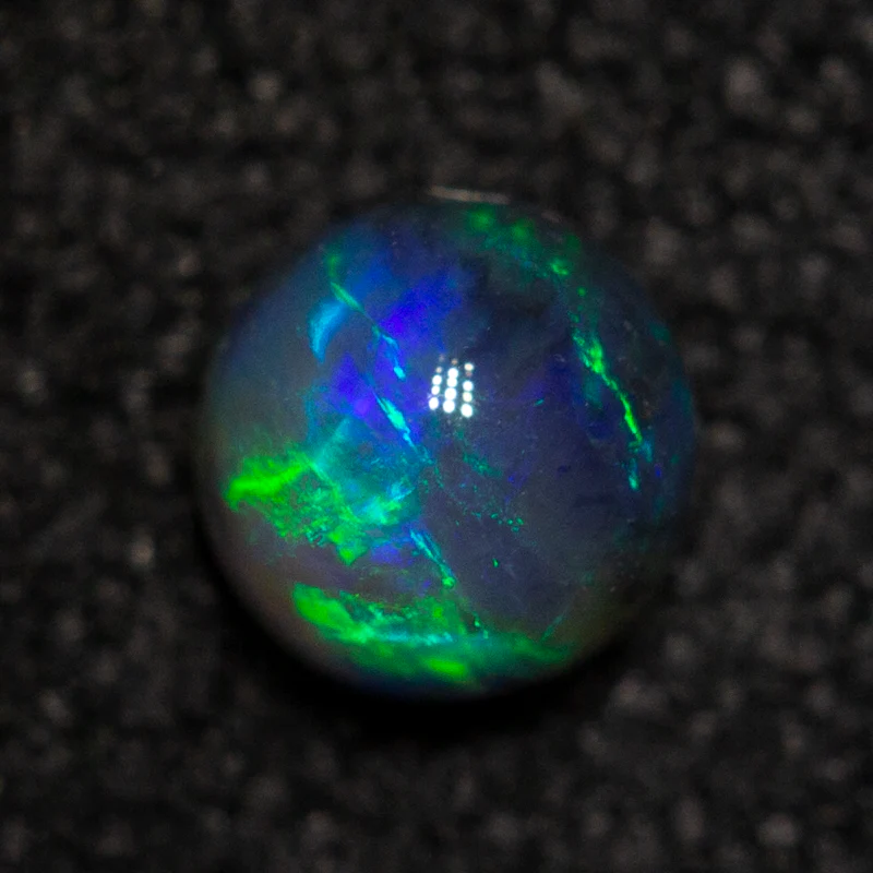 0.21 ct black opal 3.7x3.6x2.5mm