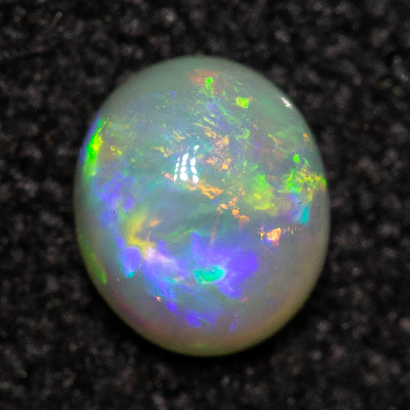 0.21 ct white opal 4.3x3.6x2.2mm