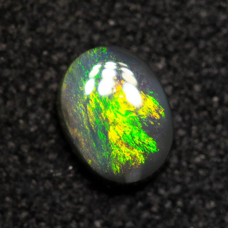 0.22 ct black opal 4.6x3.5x1.8mm