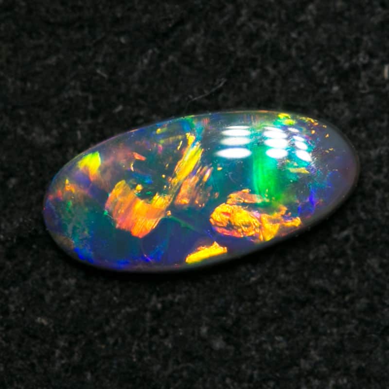 0.22 ct black opal 7.5x3x1mm