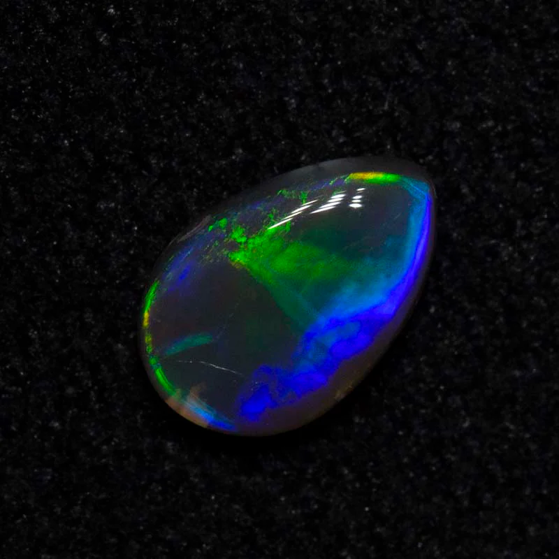 0.25 ct dark opal 5.6x3.7x1.8mm