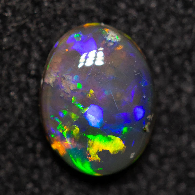 0.26 ct black opal 5.2x4x2mm
