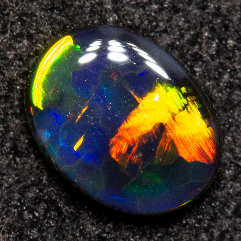 0.26 ct black opal 5.3x4.1x1.6mm