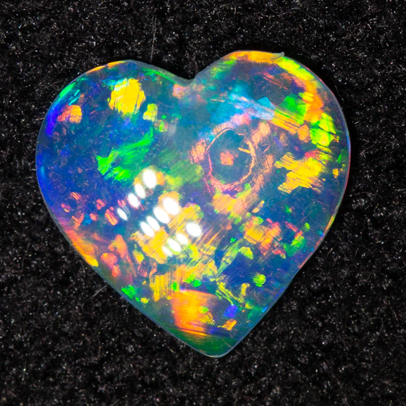 0.27 ct crystal opal 6.1x5.9x1.3mm