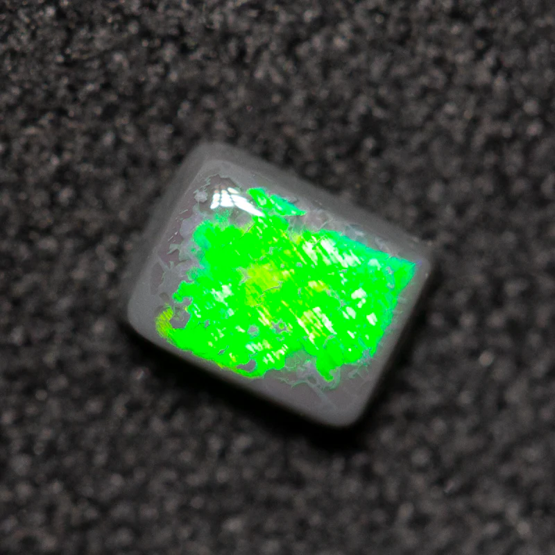 0.28 ct black opal 4.7x3.6x2mm