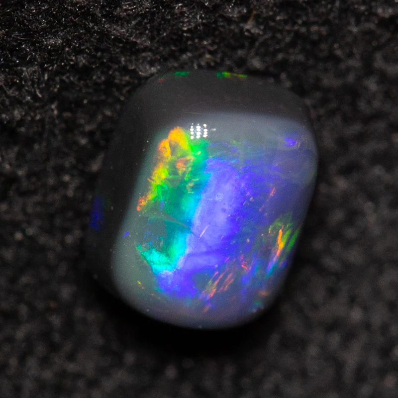 0.29 ct black opal 4.2x3.4x2.5mm