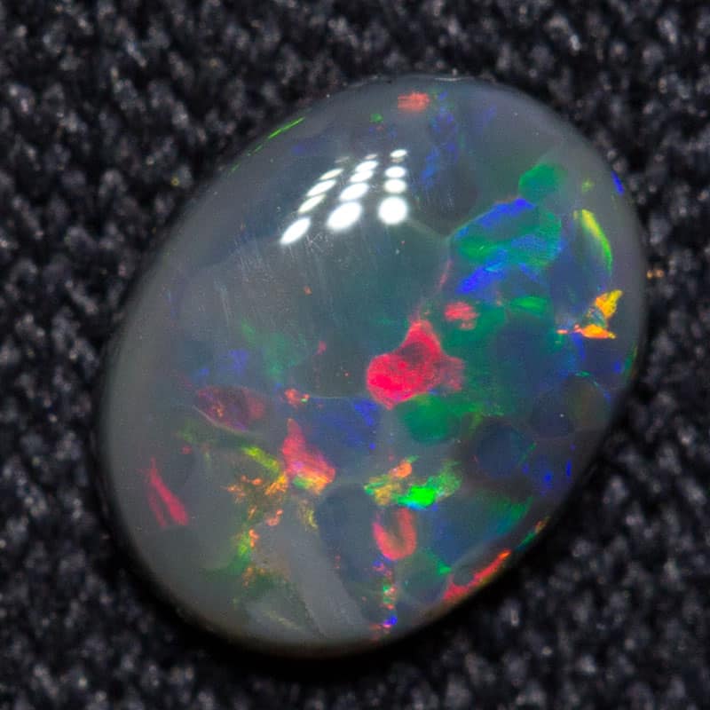 0.29 ct black opal 5.4x4.2x1.7mm