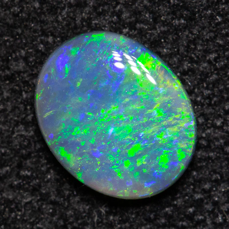 0.31 ct black opal 5.7x4.6x1.8mm