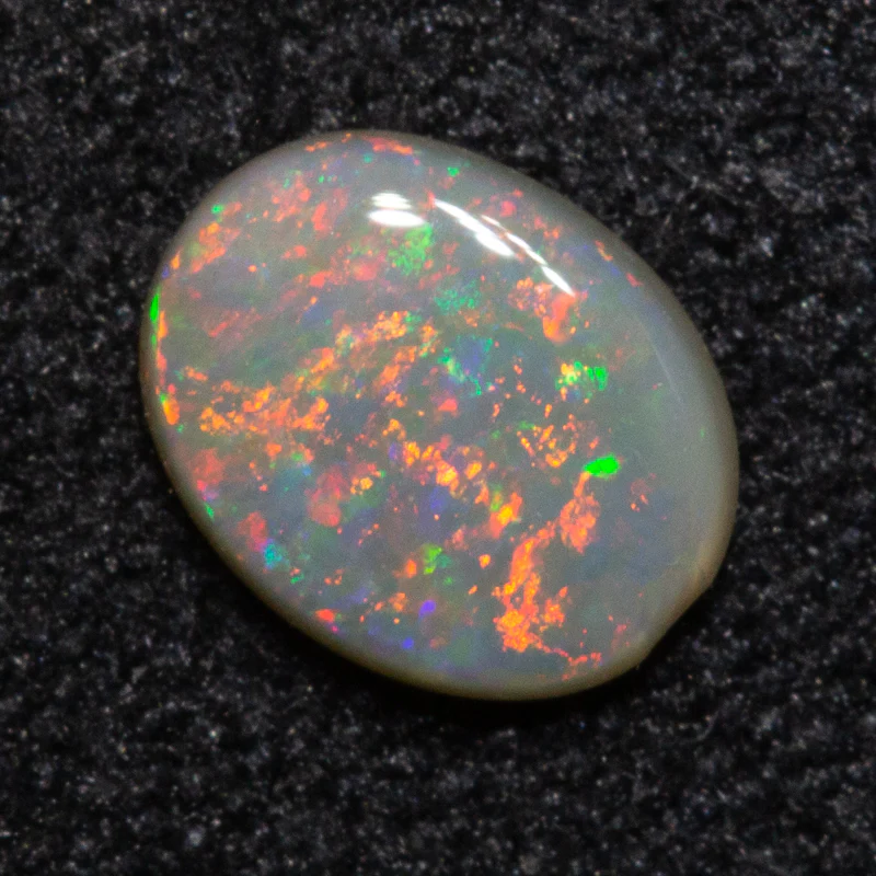 0.31 ct dark opal 5.7x4.5x1.7mm