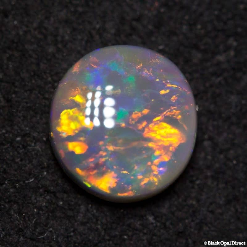 0.31 ct dark opal 5mm round x1.8mm