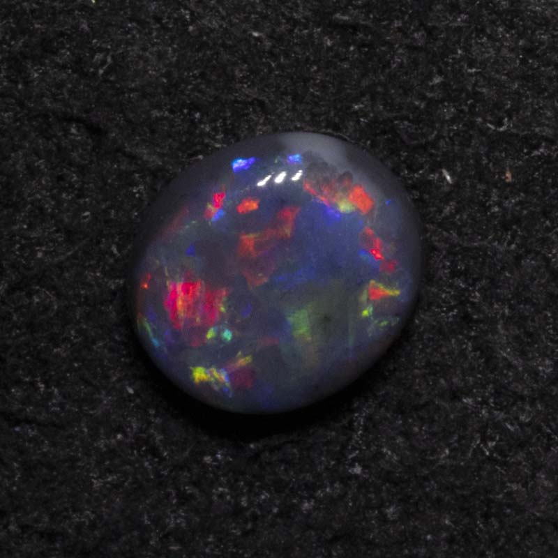 0.32 ct black opal 4.9x4.4x2.4mm