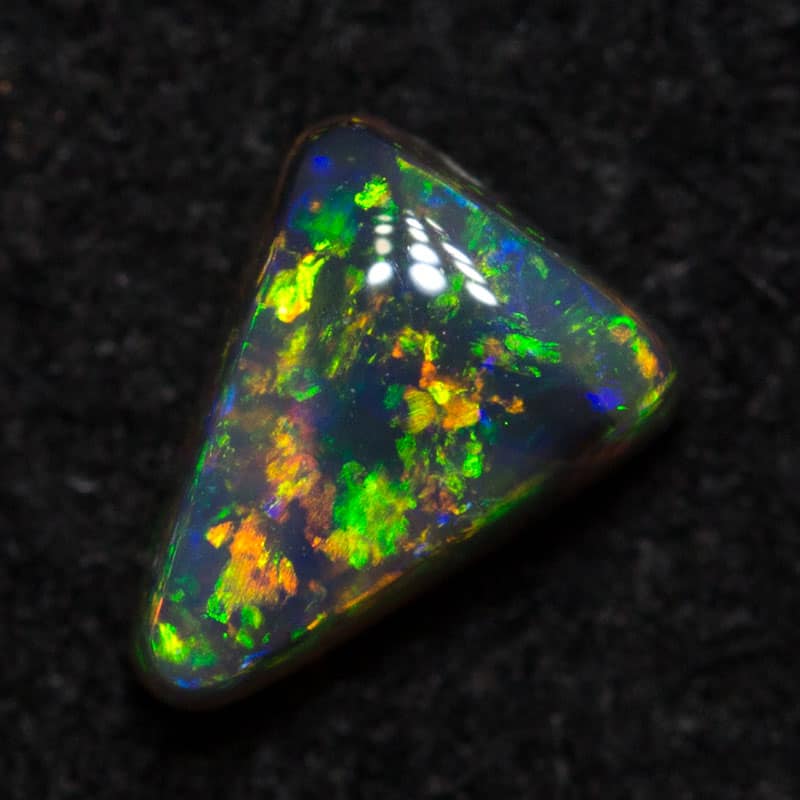 0.33 ct black opal 5.3x4x2.6mm