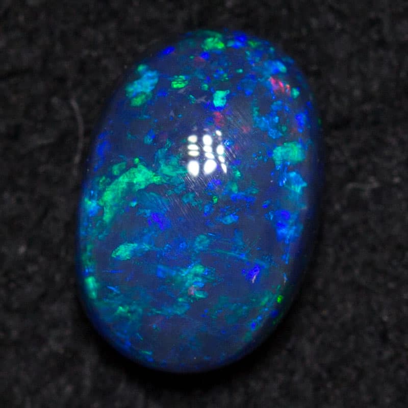 0.33 ct black opal 5.5x3.8x2.5mm