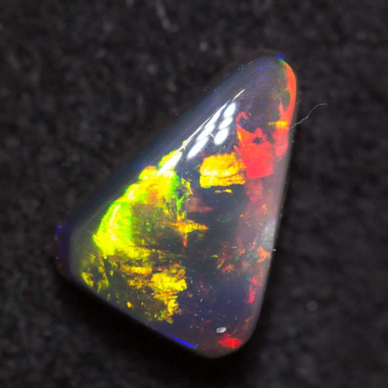 0.33 ct black opal 5.6x4x2.5mm