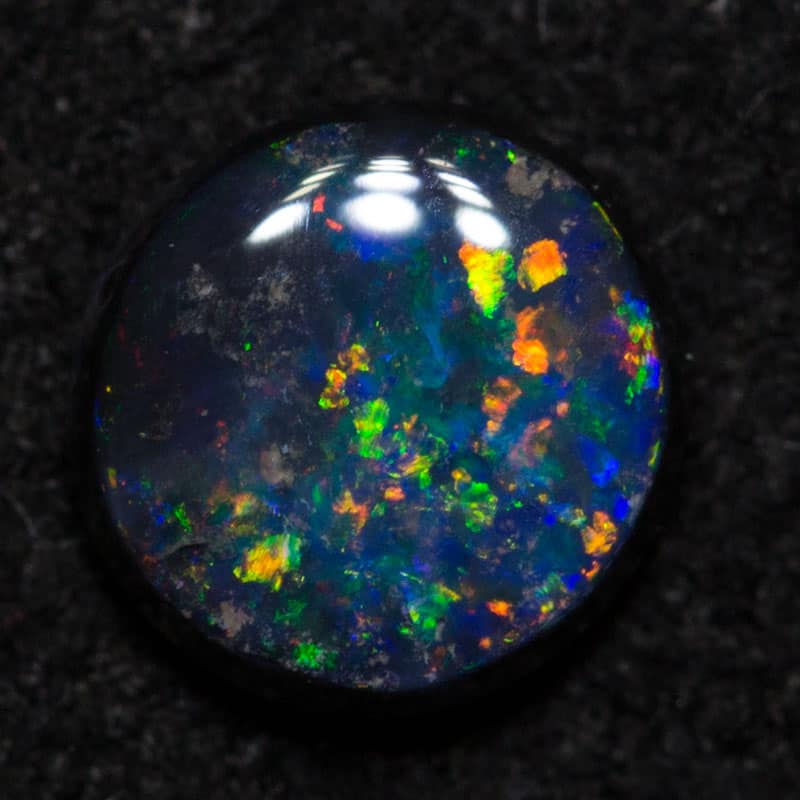 0.33 ct black opal 5x4.8x2mm