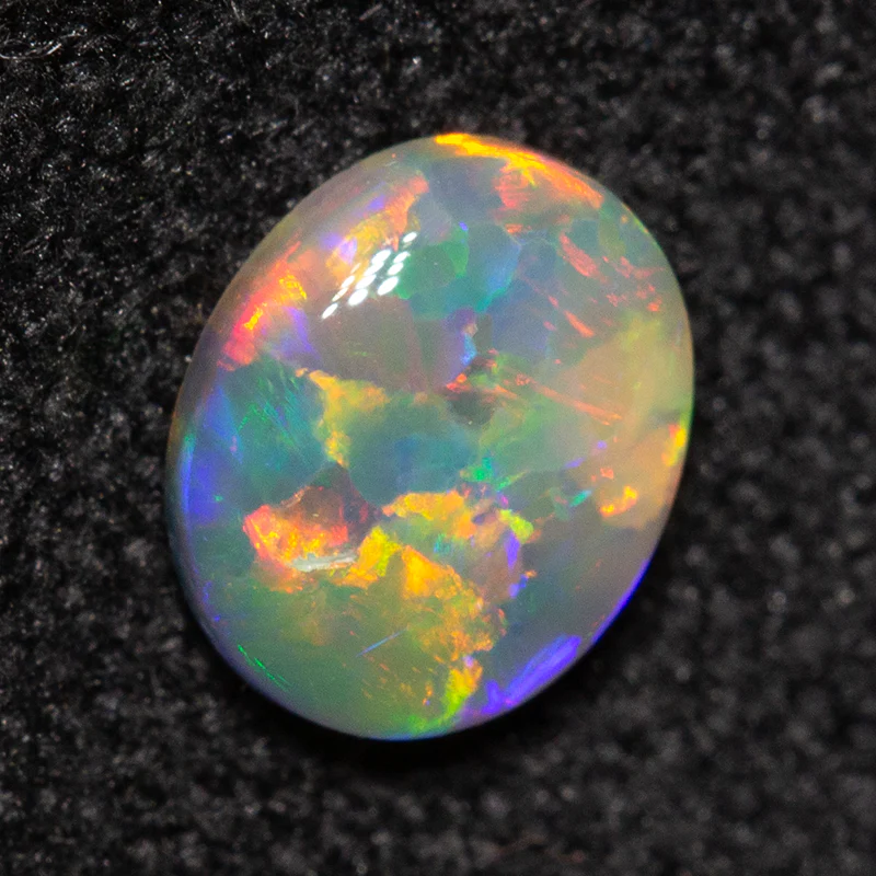0.33 ct dark opal 5.5x4.5x1.9mm