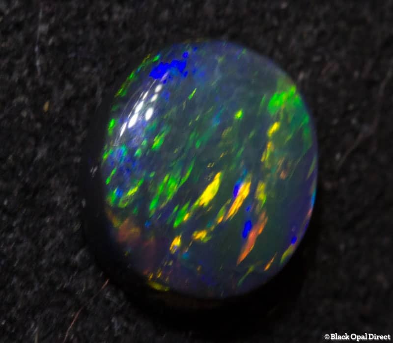 0.35 ct black opal 5.5x5x2mm