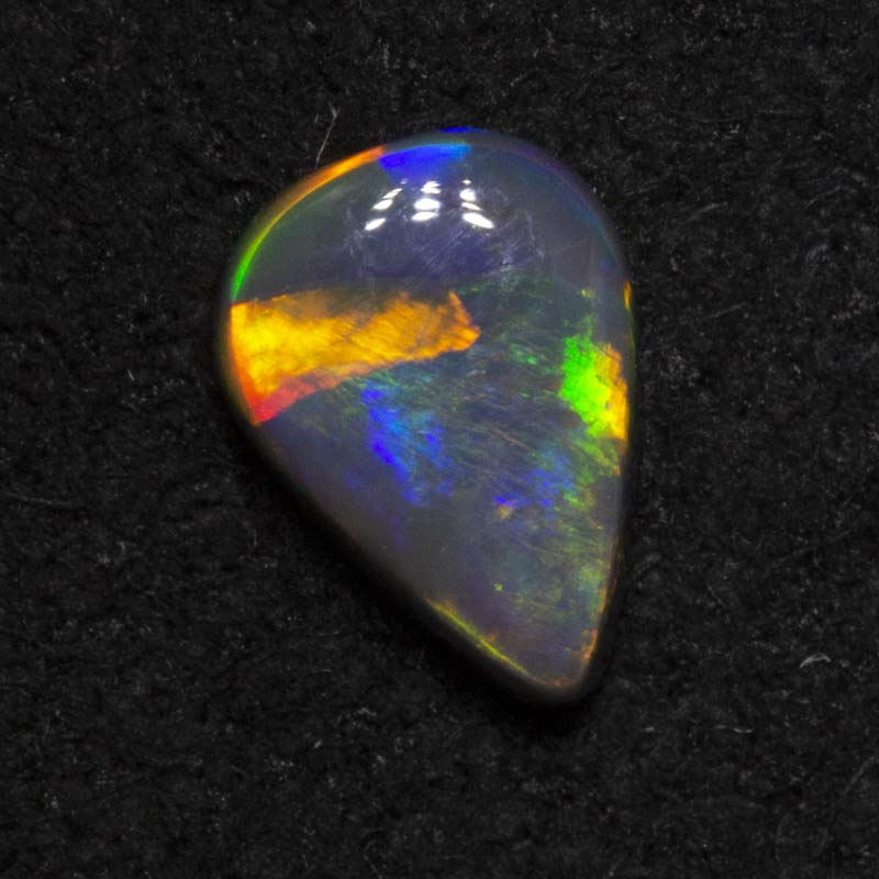 0.35 ct black opal 6.1x4.4x2mm