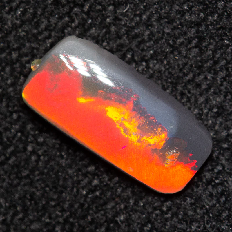 0.35 ct black opal 7.7x3.7x1.7mm