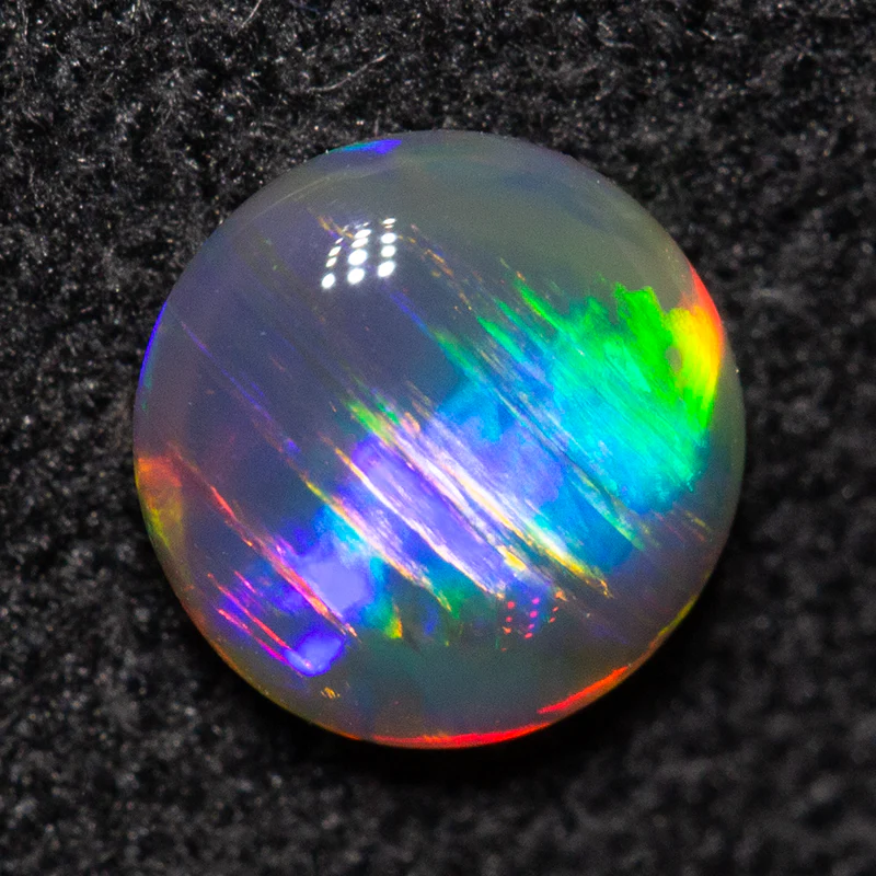 0.35 ct double-sided black opal 5.2x5.1x2.1mm