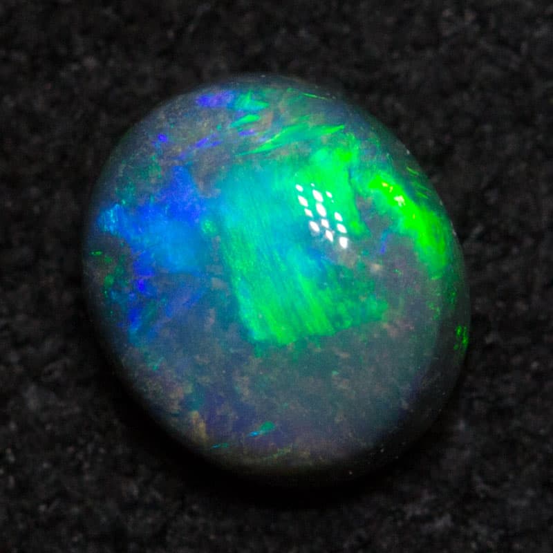 0.36 ct black opal 4.8x4.1x2.7mm