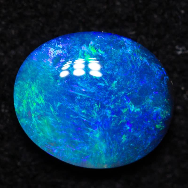 0.36 ct black opal 5.7x4.9x2.1mm