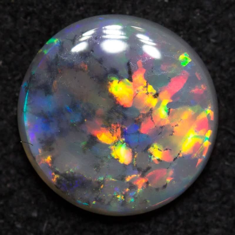 0.37 ct dark opal 5.9x5.8x1.8mm