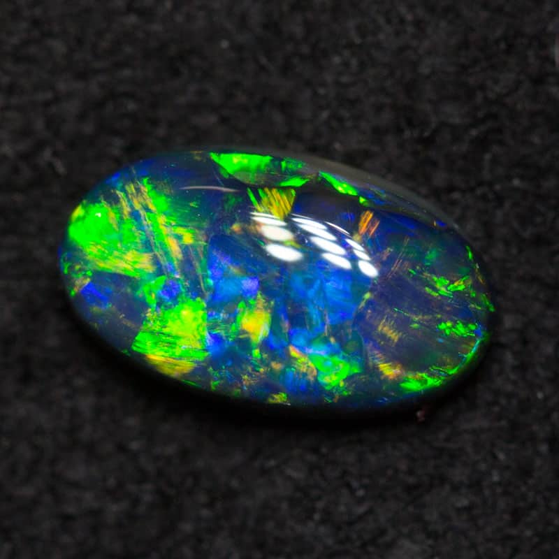 0.38 ct black opal 6.4x3.8x2.3mm