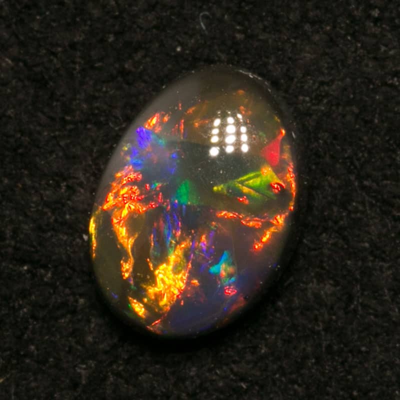 0.38 ct gem black opal 5.5x4x2mm
