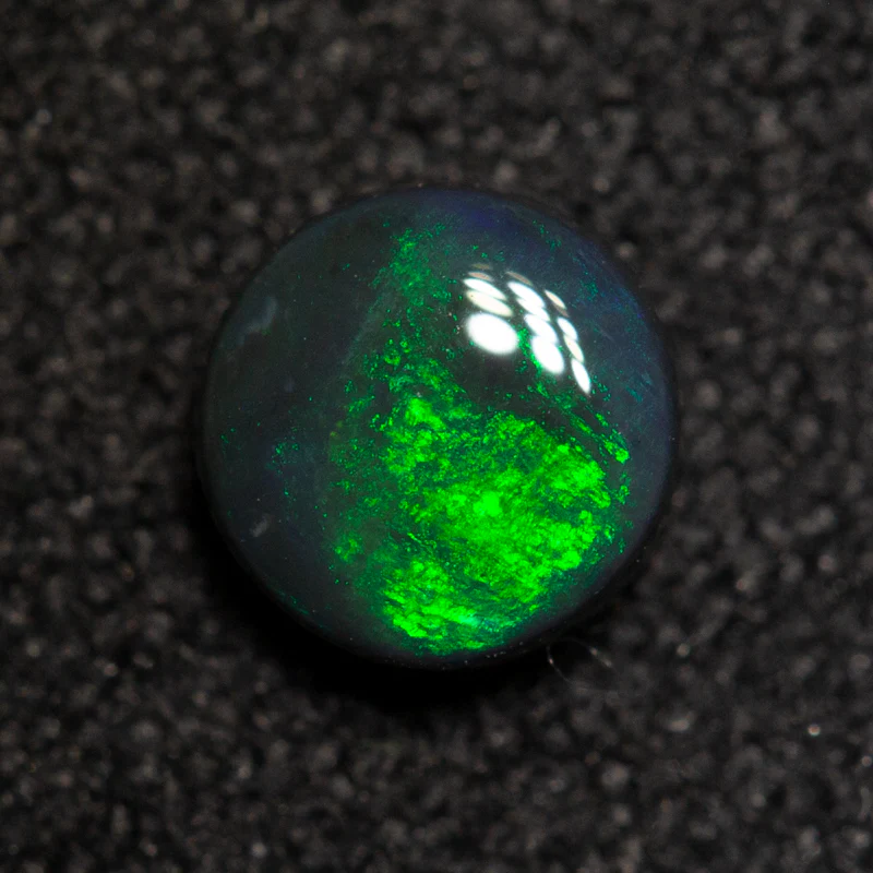 0.39 ct black opal 4.9x4.8x2.2mm