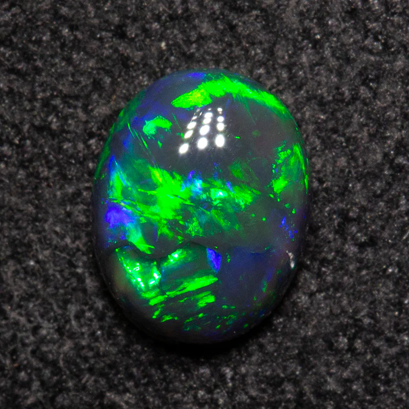 0.39 ct black opal 5.6x4.5x2.2mm