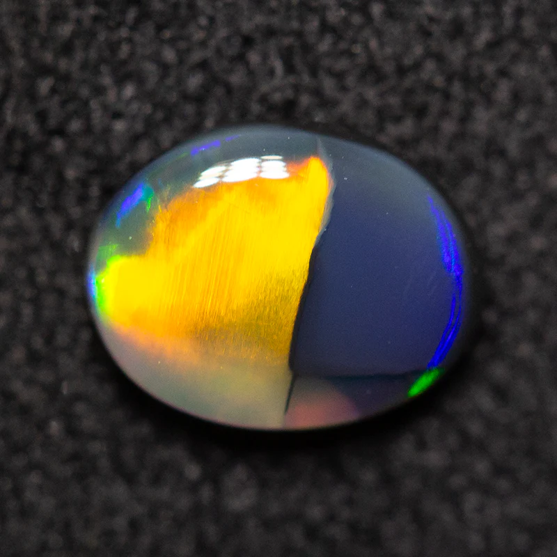 0.39 ct black opal 6.3x4.9x2mm