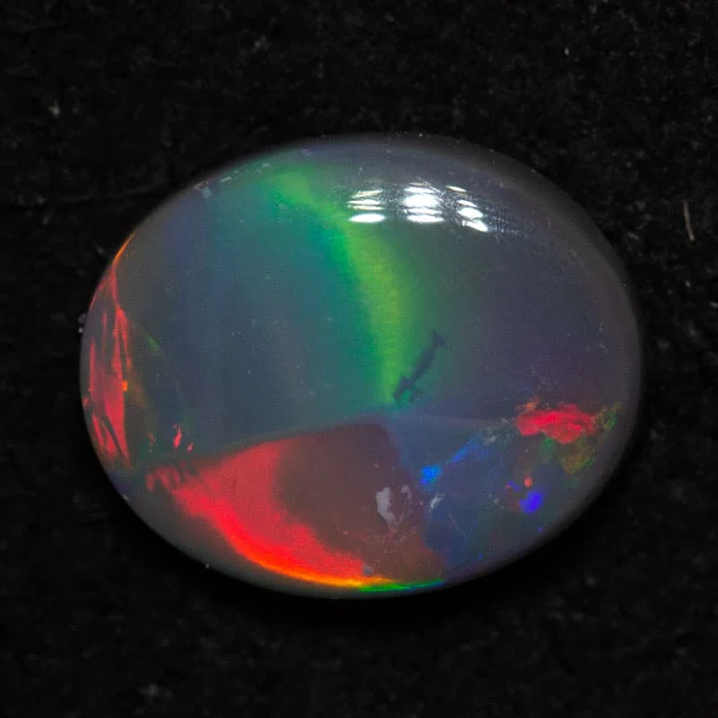 0.39 ct black opal 6.3x5.3x2mm