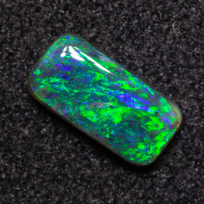 0.39 ct black opal 7x3.5x1.9mm