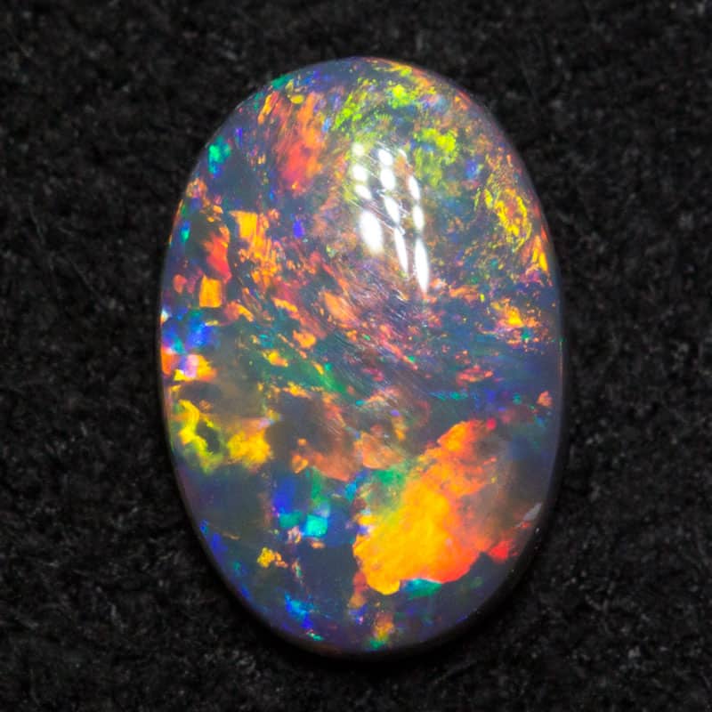 0.39 ct black opal 7x4.7x1.8mm