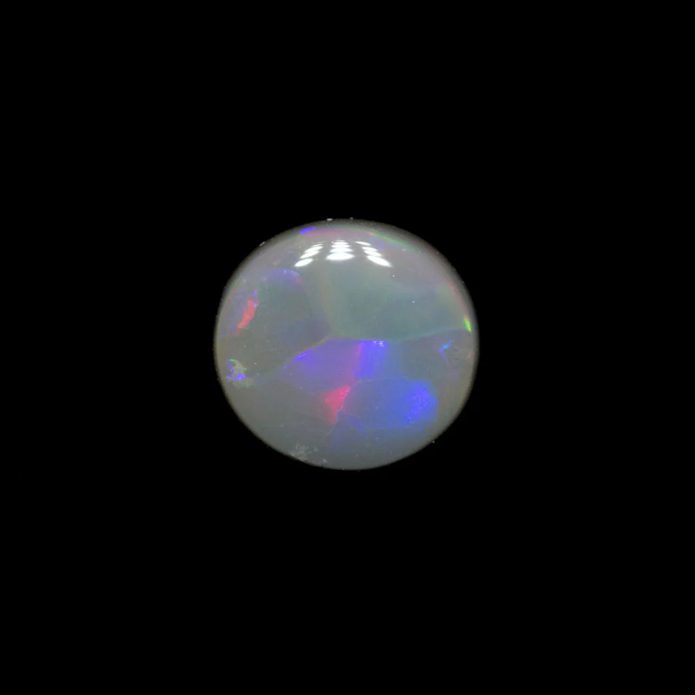 0.39 ct dark opal 5.6x5.2x1.8mm