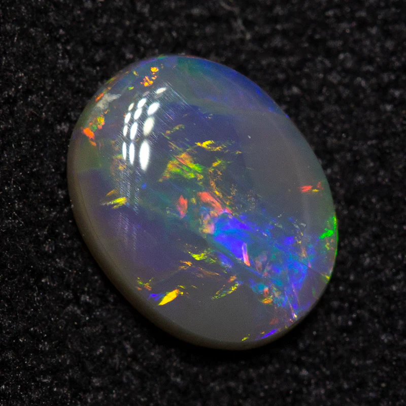 0.39 ct dark opal 6.5x5.2x1.5mm