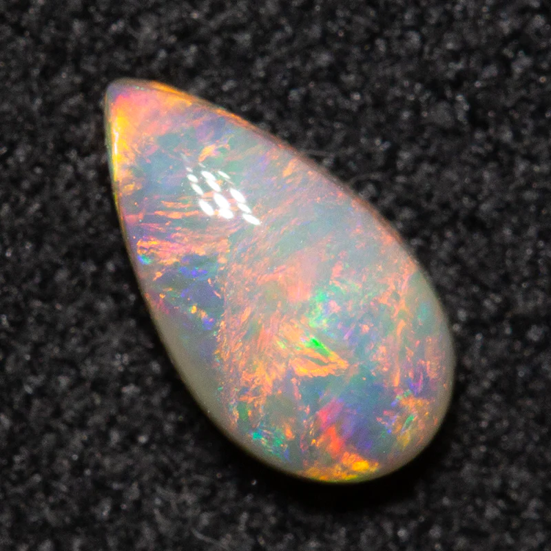 0.39 ct dark opal 6.7x3.7x2.4mm
