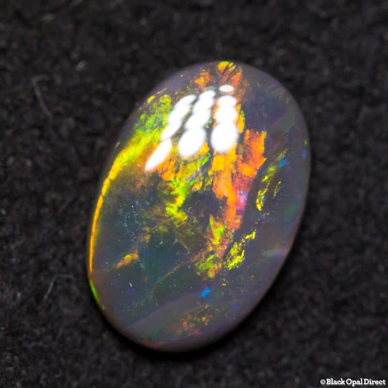 0.39 ct dark opal 6.8x4.8x1.8mm
