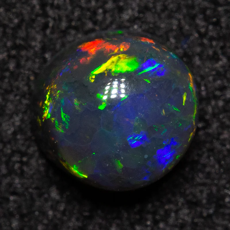 0.40 ct black opal 4.7x4.5x2.8mm