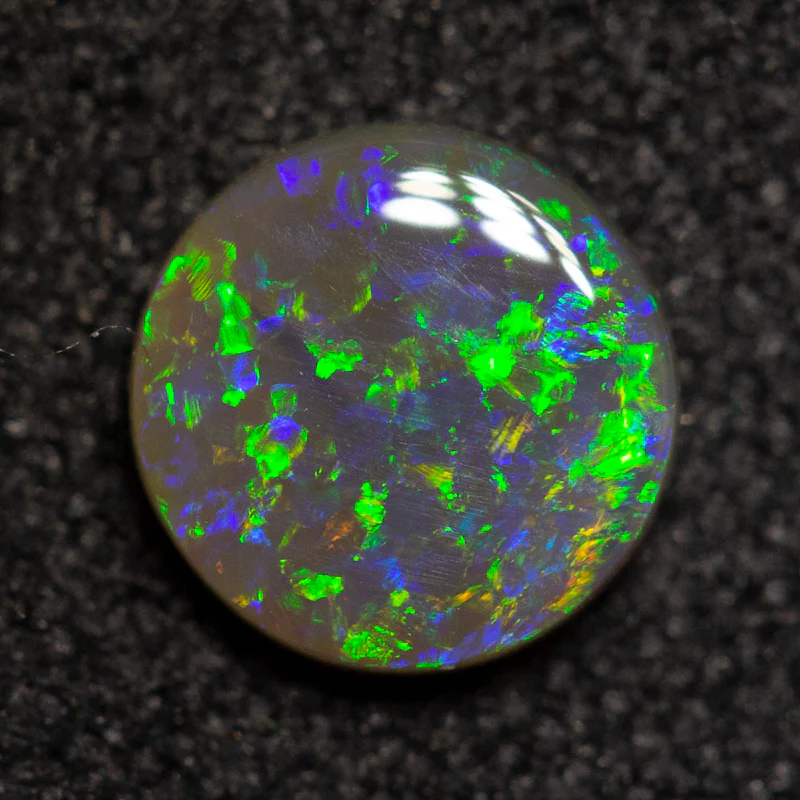 0.40 ct black opal 5.5x5.5x1.7mm