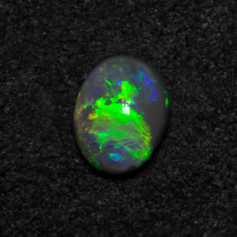 0.40 ct black opal 5.9x4.7x2.6mm