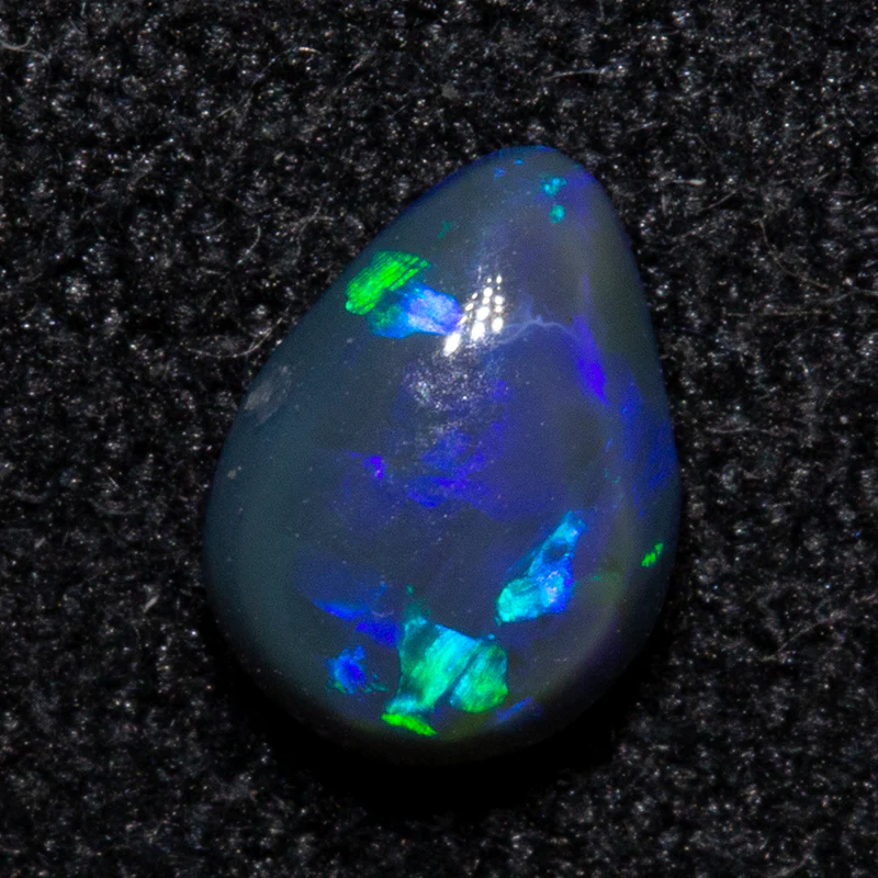 0.40 ct black opal 6x4.5x2.6mm