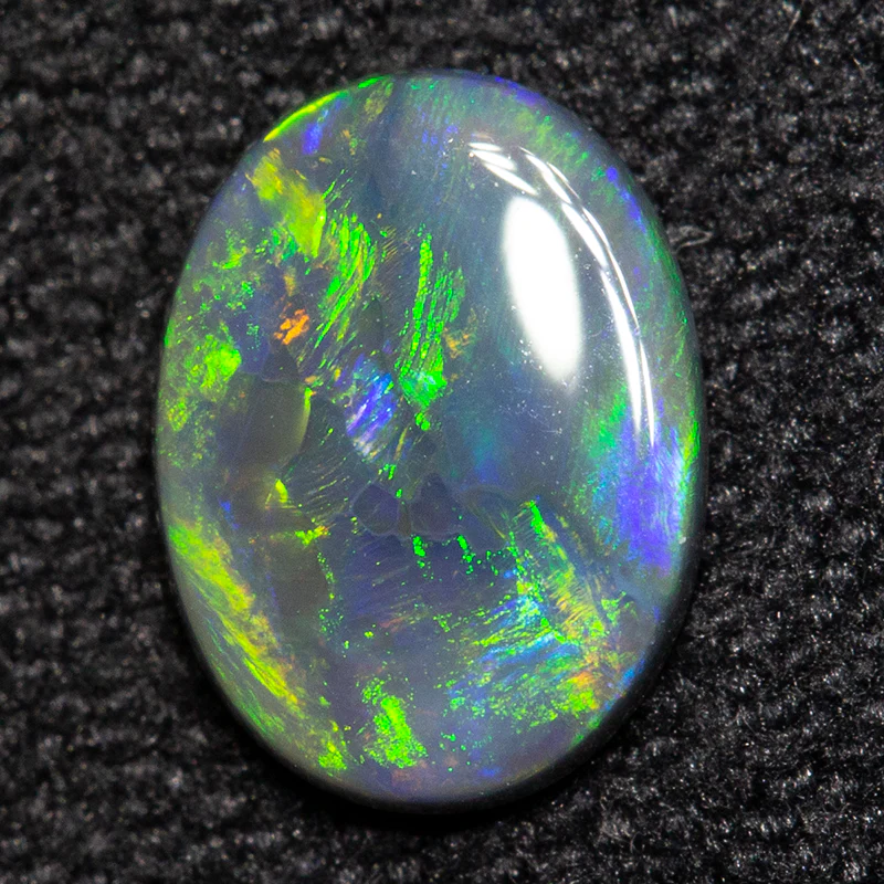 0.40 ct black opal 7.1x5.3x1.6mm