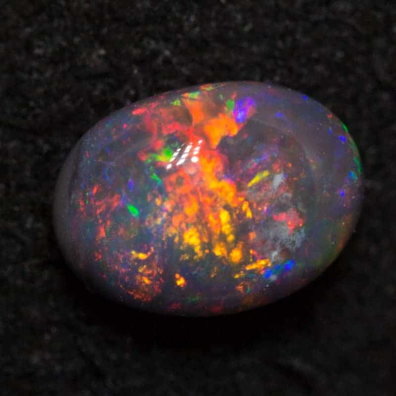 0.41 ct black opal 5.5x4x2.9mm