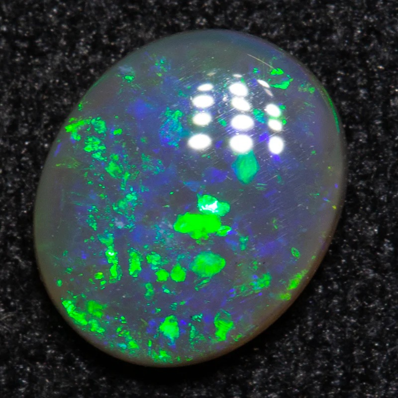 0.41 ct black opal 6.2x5.1x1.9mm