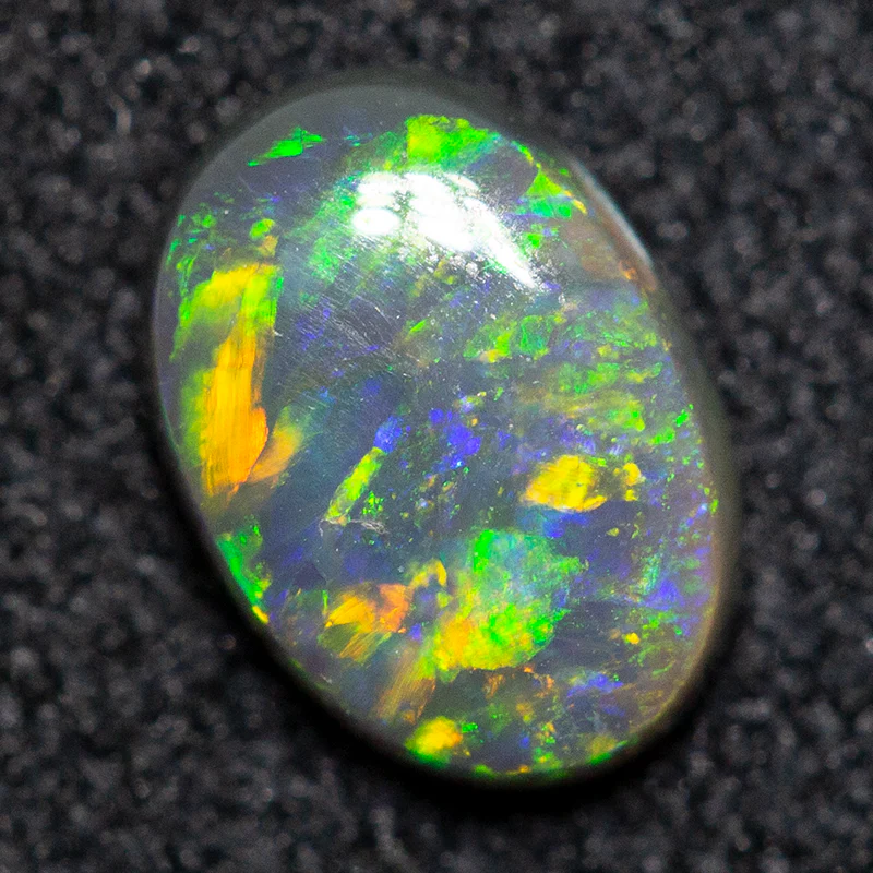 0.41 ct black opal 6.3x4.4x2.1mm